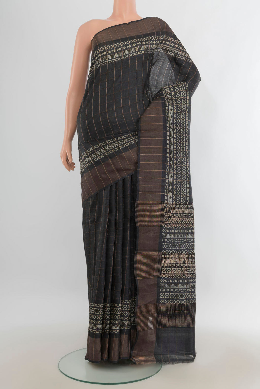 Multi Color Tussar Saree with Floral Print on the body and Silk Border.  displayed on a mannequin