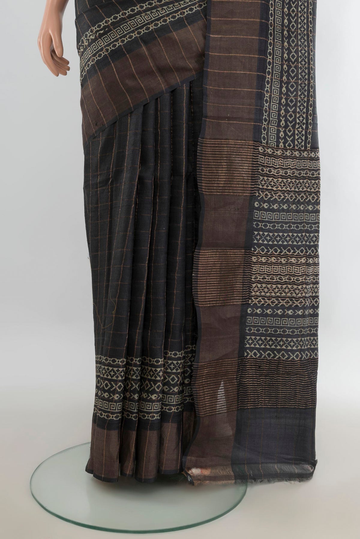 Pleats and pallu of Multi Color Tussar Saree with Floral Print on the body and Silk Border. 