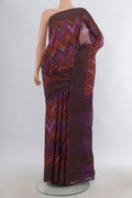Purple Tussar Saree with Printed design on the body and Zari Border.  displayed on a mannequin