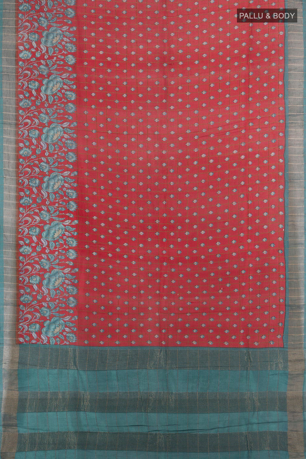Flat view of Red Tussar Saree with Printed design on the body and Zari And Thread Border. 