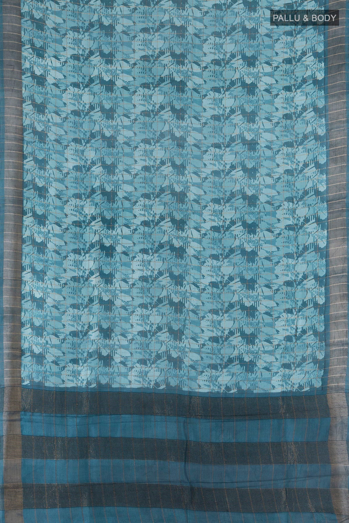 Flat view of Teal Tussar Saree with Floral Print on the body and Zari Border. 