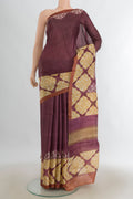 Multi Color Tussar Saree with Floral Print on the body and Silk Border.  displayed on a mannequin
