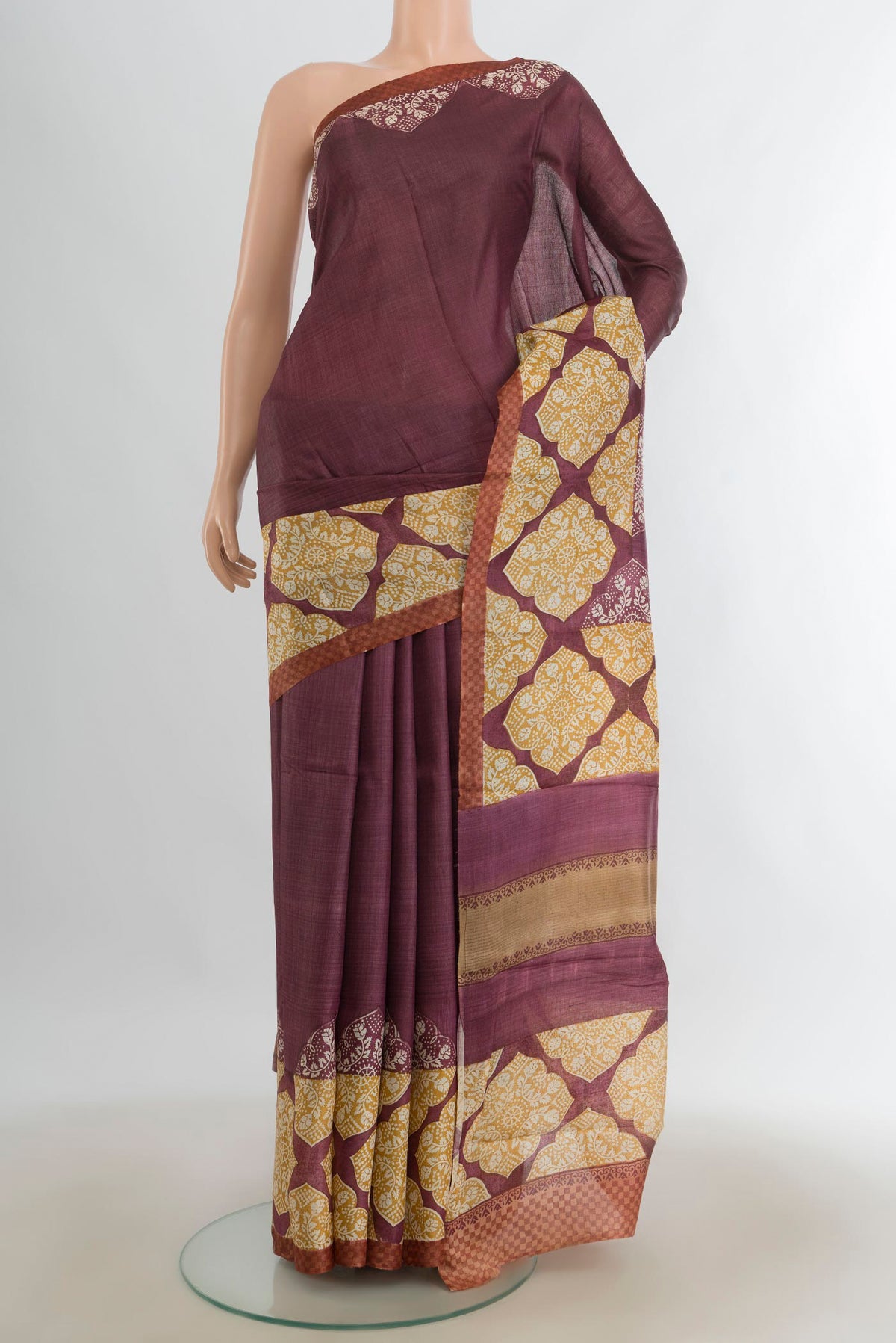 Multi Color Tussar Saree with Floral Print on the body and Silk Border.  displayed on a mannequin
