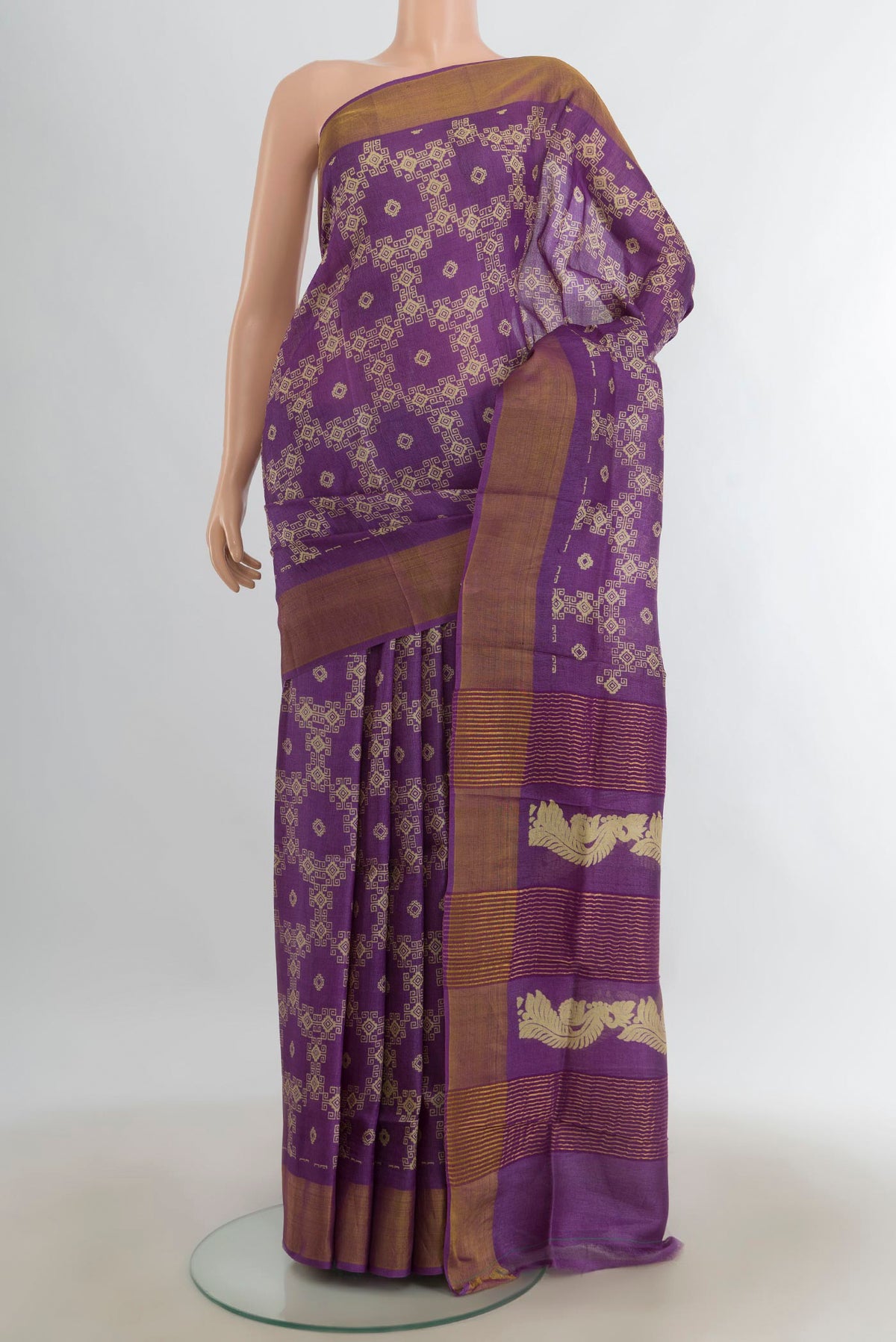 Violet Tussar Saree with Floral Print on the body and Silk Border.  displayed on a mannequin
