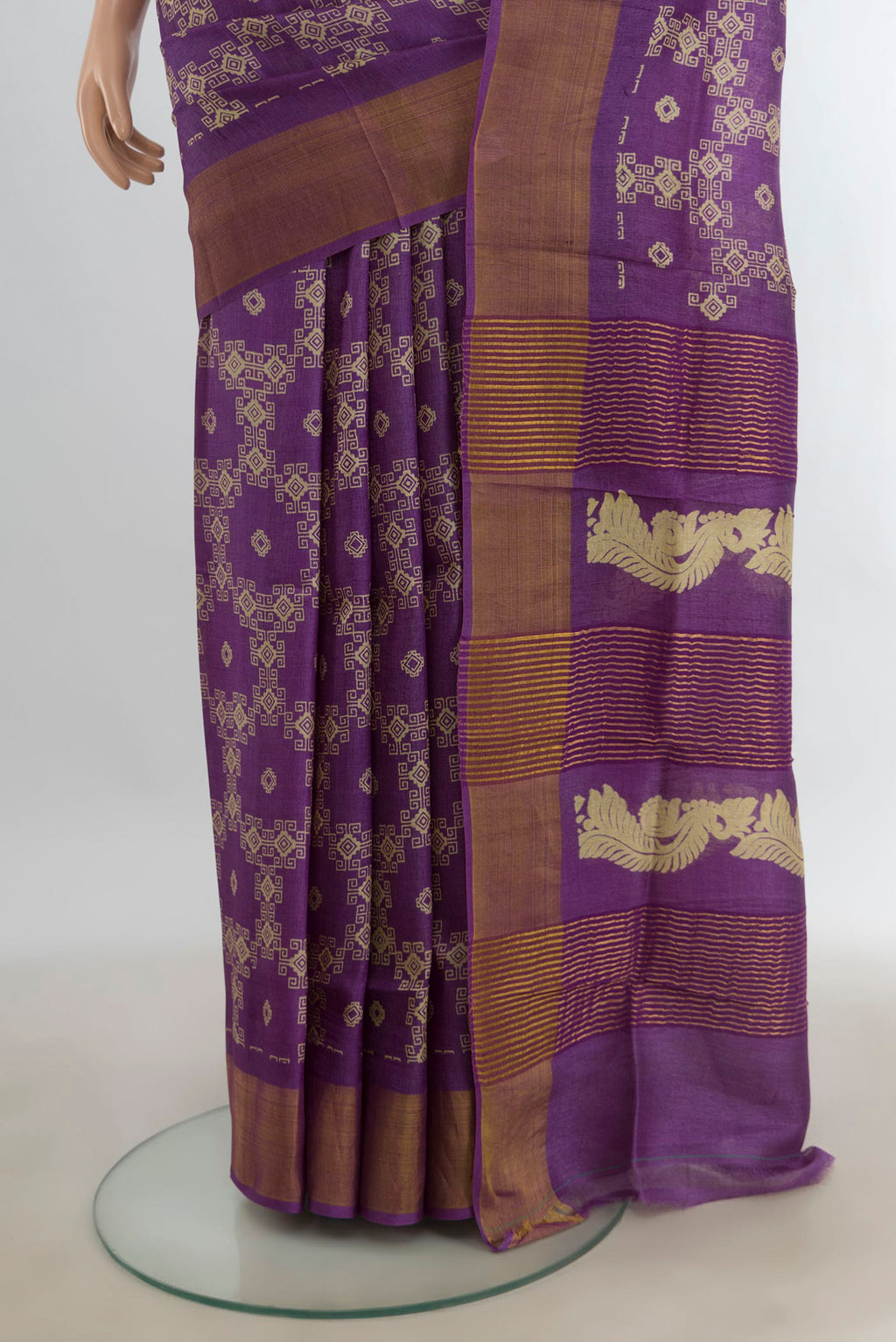 Pleats and pallu of Violet Tussar Saree with Floral Print on the body and Silk Border. 