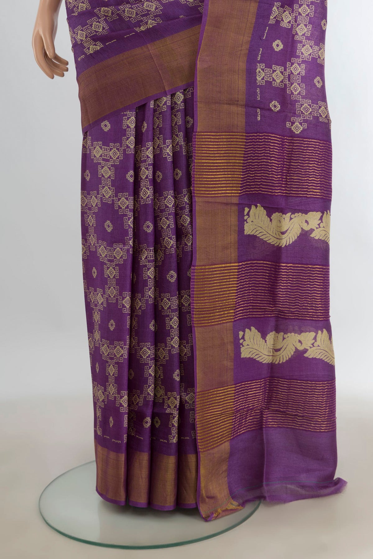 Pleats and pallu of Violet Tussar Saree with Floral Print on the body and Silk Border. 