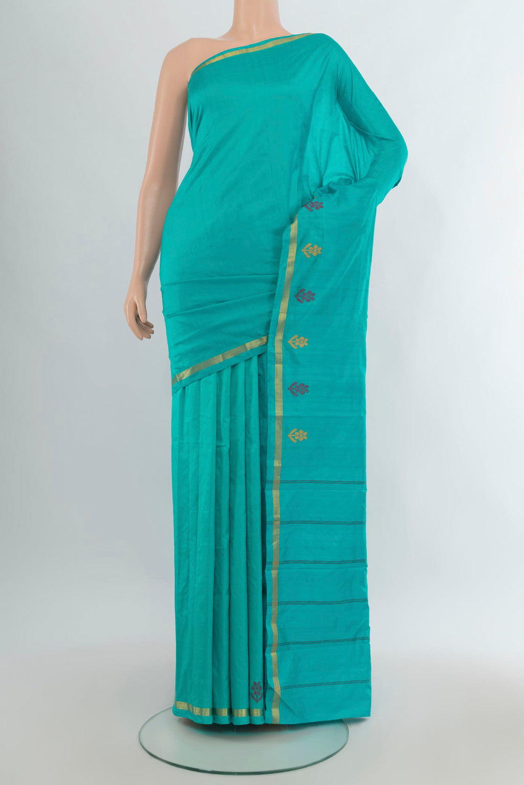 Pure Silk Turquoise Kanjivaram Saree with Plain Body and Zari Border.  displayed on a mannequin