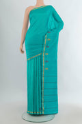 Pure Silk Turquoise Kanjivaram Saree with Plain Body and Zari Border.  displayed on a mannequin