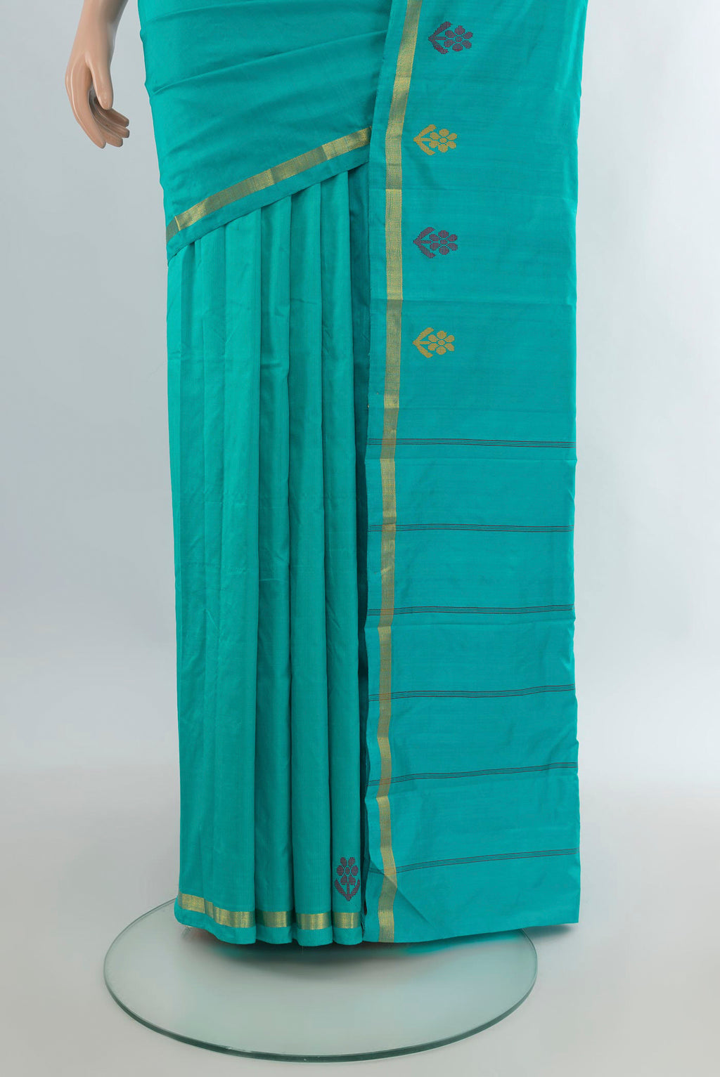 Pleats and pallu of Pure Silk Turquoise Kanjivaram Saree with Plain Body and Zari Border. 