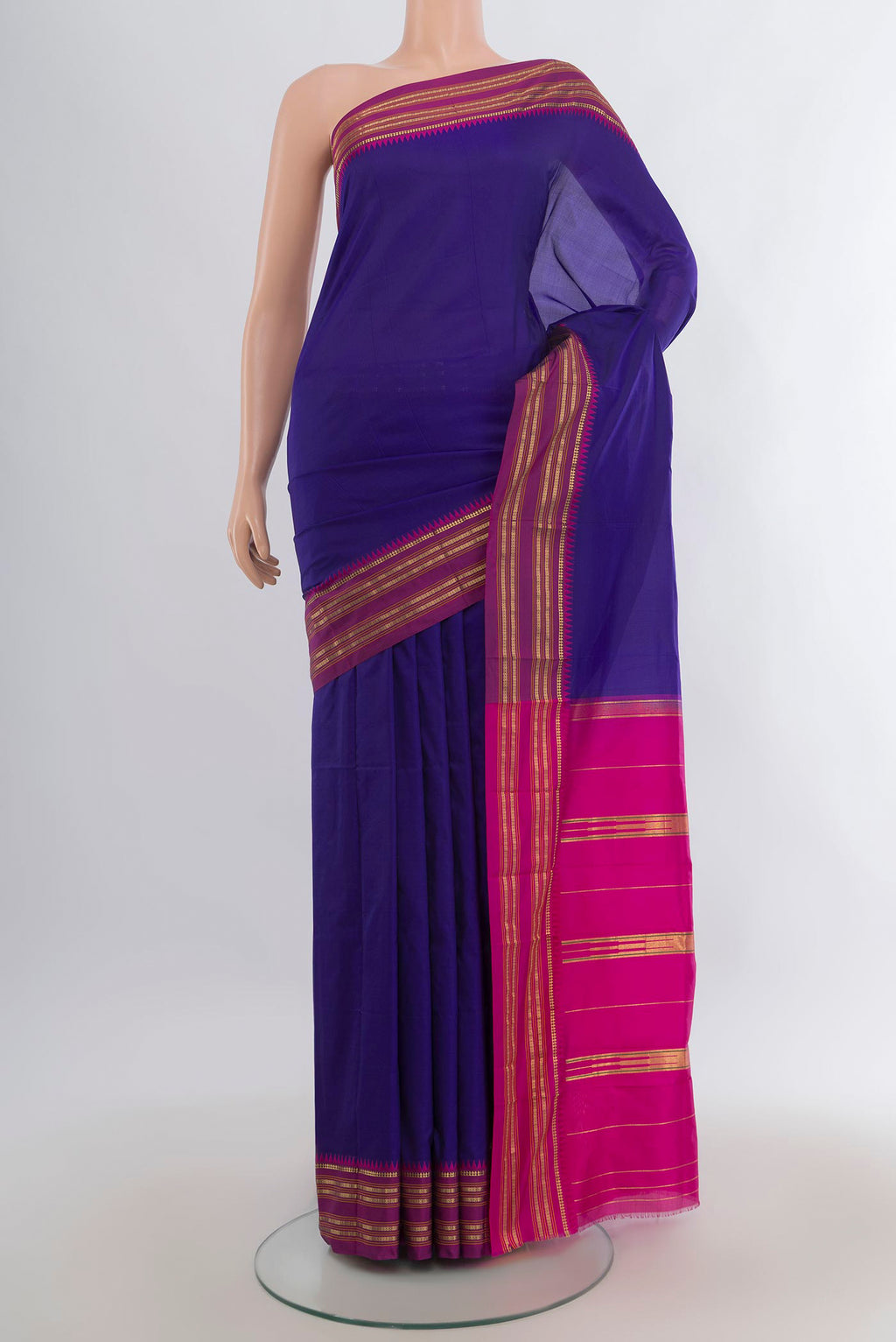 Pure Silk Navy Blue Narayanpet Saree with Plain Body and Zari Border.  displayed on a mannequin