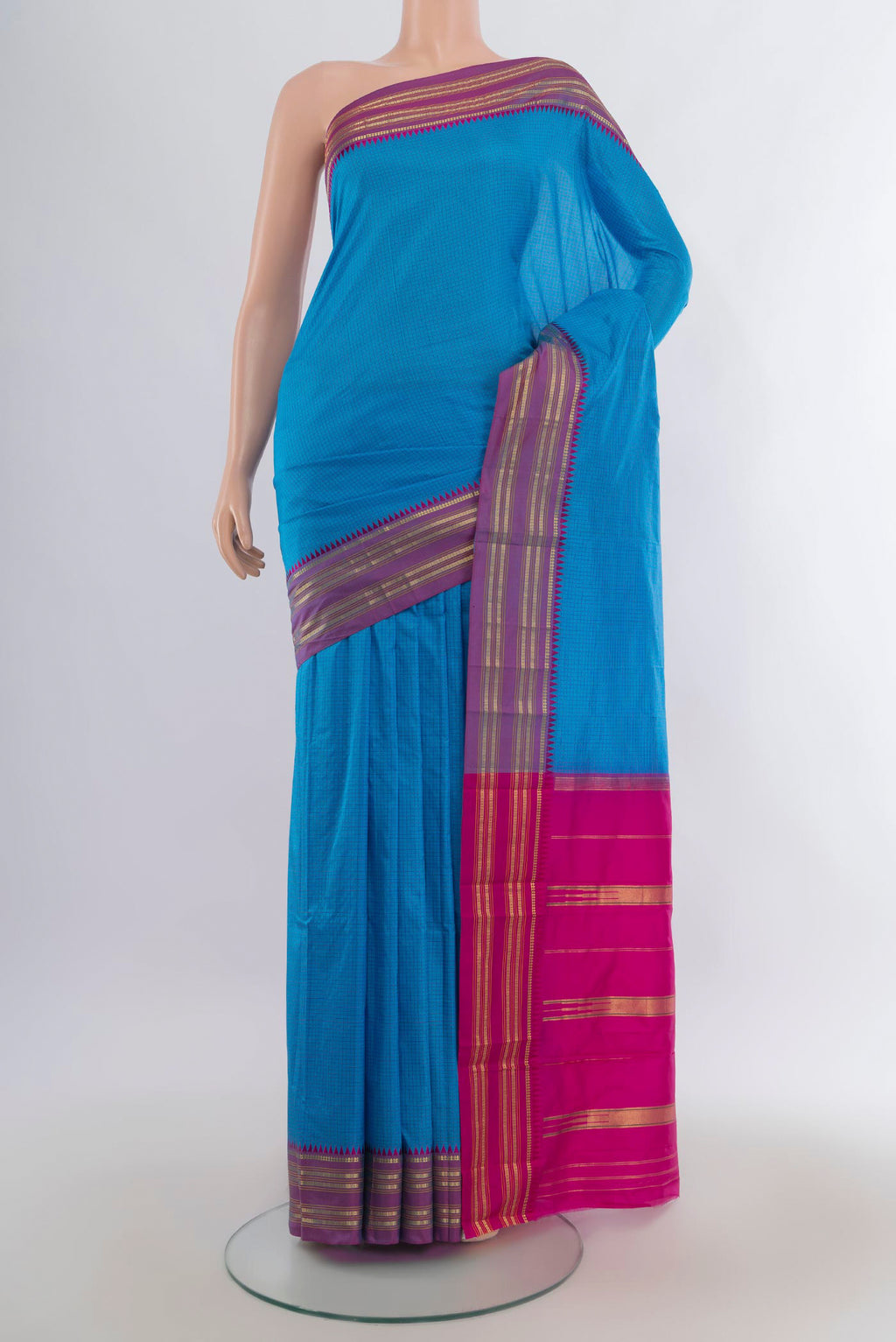 Pure Silk Blue Narayanpet Saree with Checked design on the body and Zari Border.  displayed on a mannequin