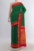 Pure Silk Green Bangalore - kadyal Saree with Zari Butta on the body and Zari Border.  displayed on a mannequin