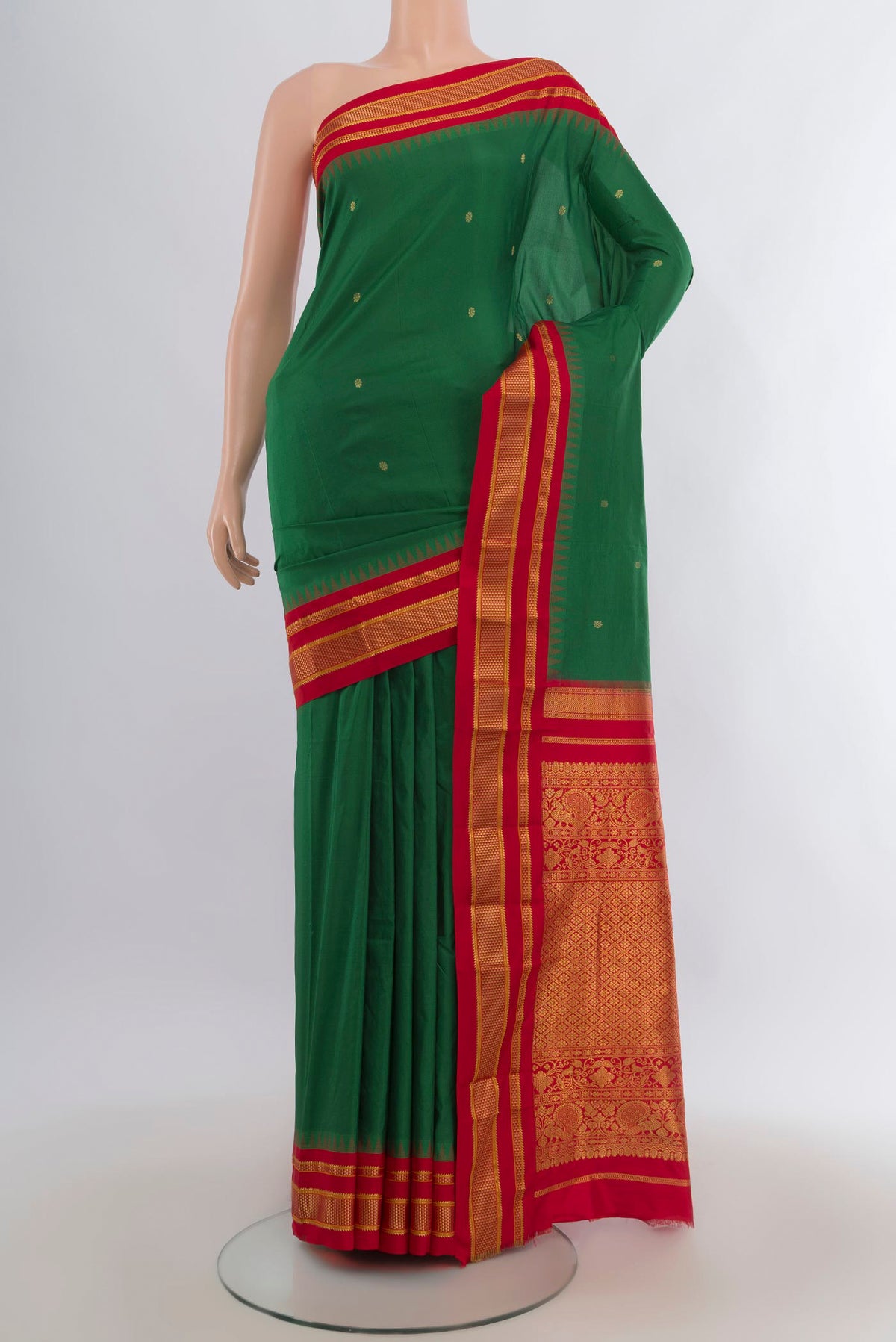 Pure Silk Green Bangalore - kadyal Saree with Zari Butta on the body and Zari Border.  displayed on a mannequin