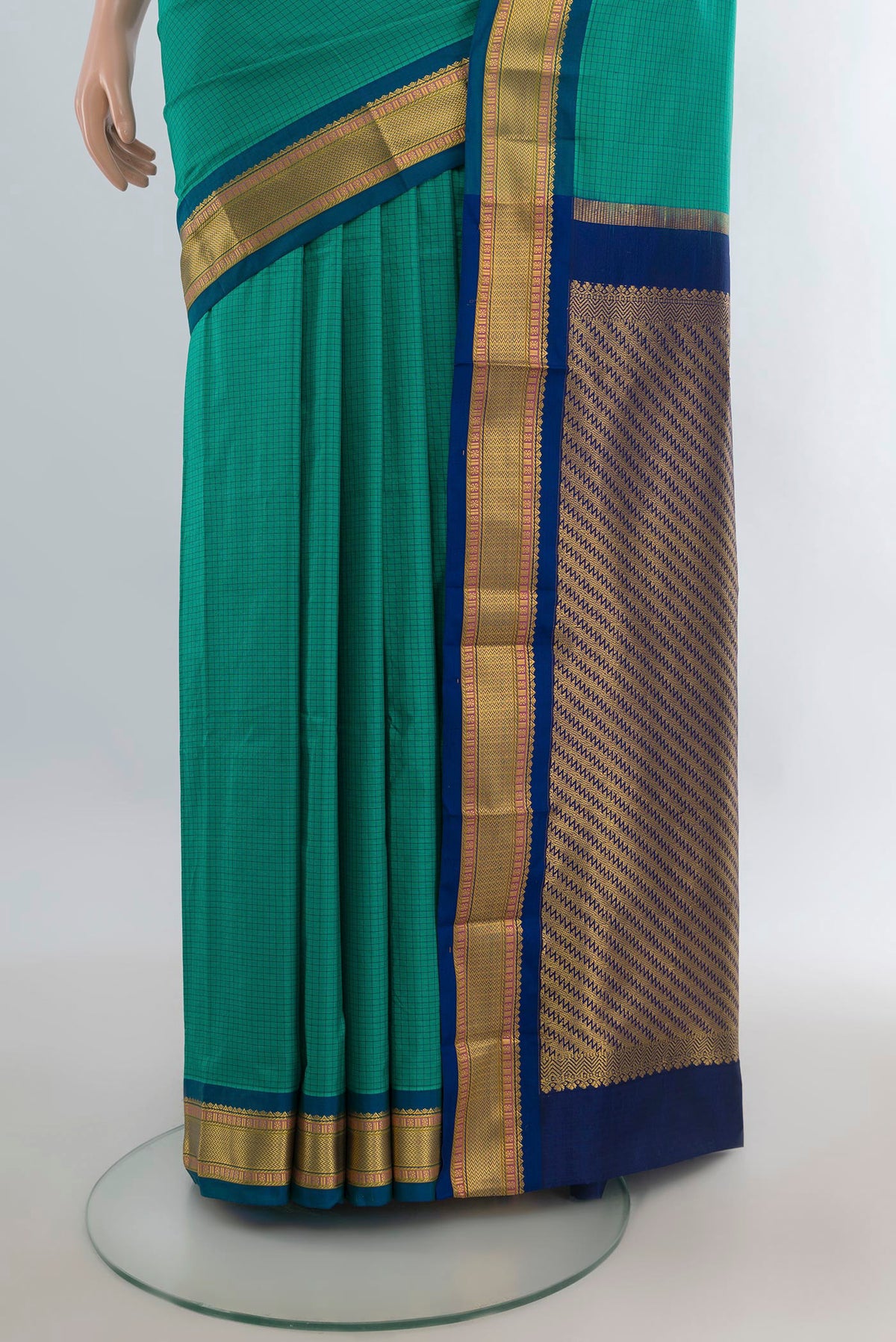 Pleats and pallu of Pure Silk Green Narayanpet Saree with Checked design on the body and Zari Border. 