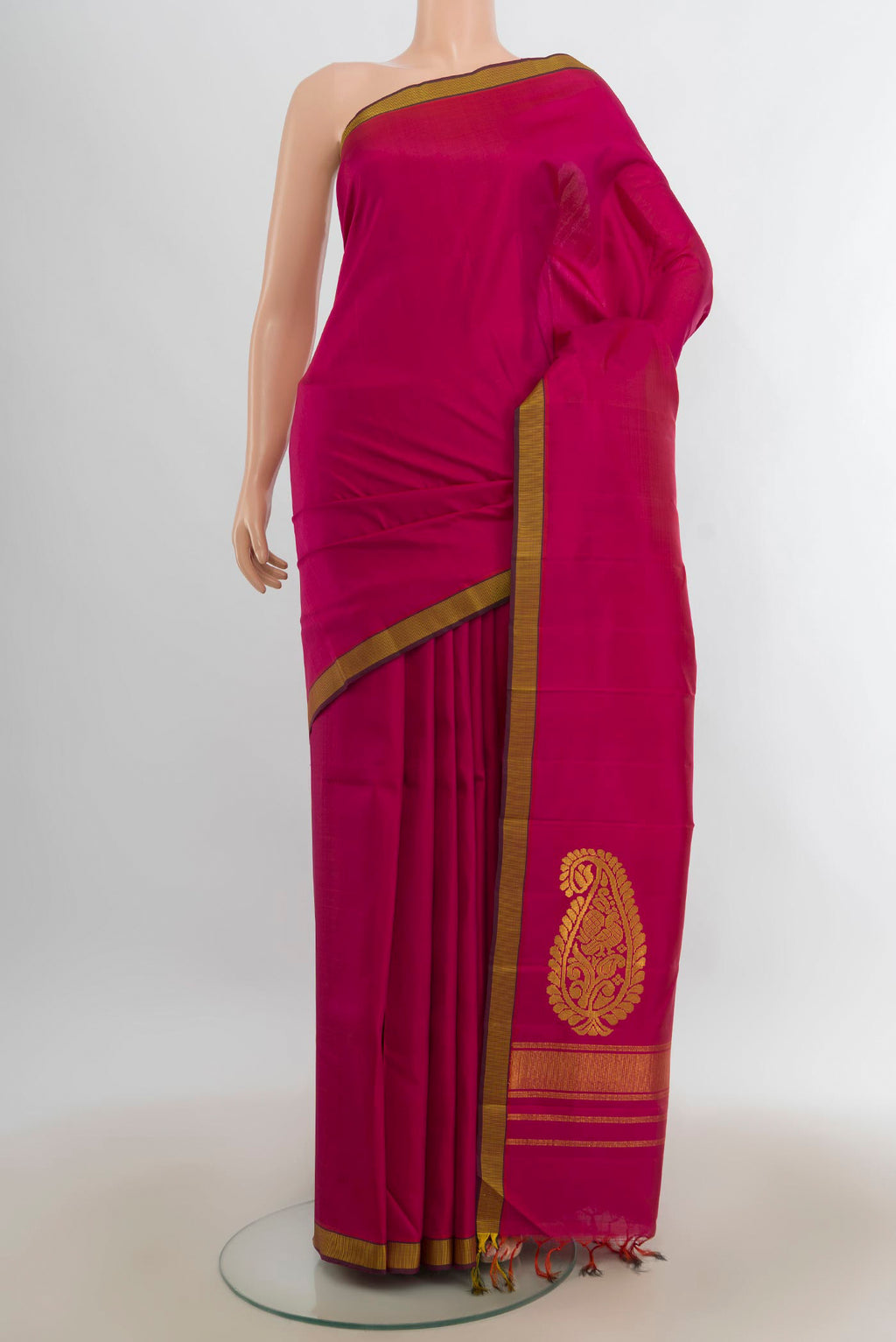 Pure Silk Dark Pink Kanchipuram Saree with Plain Body and Silk Border.  displayed on a mannequin