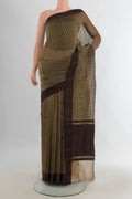 Coffee Brown Tussar Saree with Stripes on the body and Plain Border.  displayed on a mannequin