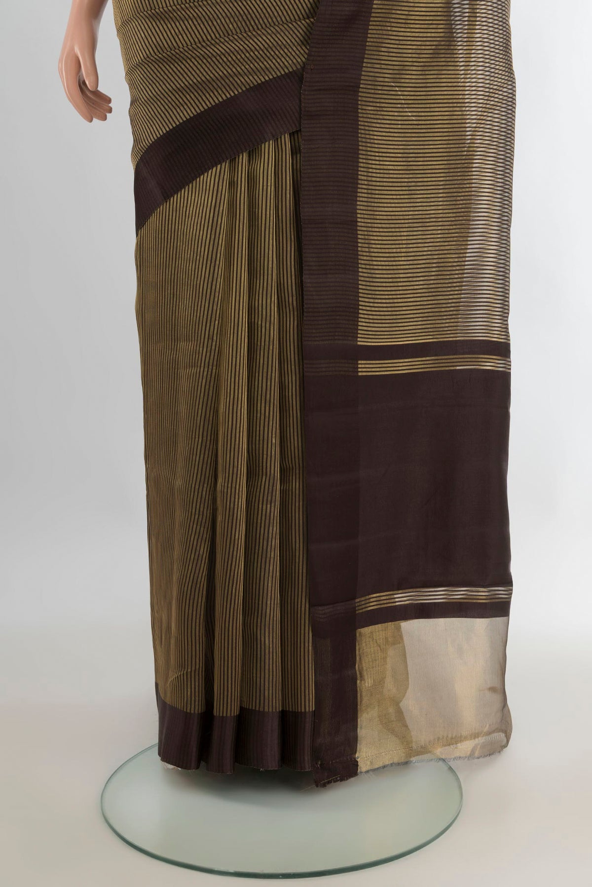 Pleats and pallu of Coffee Brown Tussar Saree with Stripes on the body and Plain Border. 