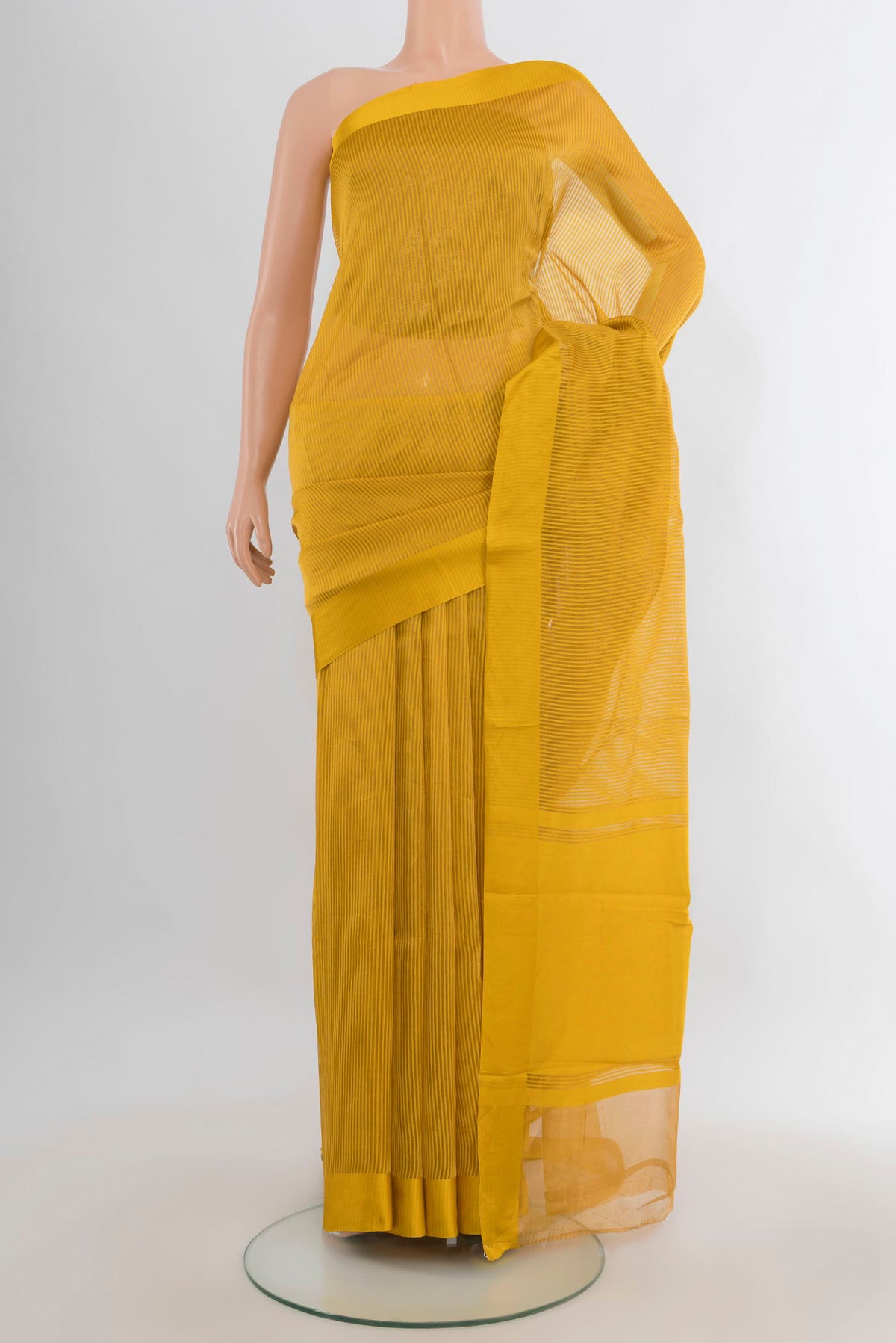 Mustard Tussar Saree with Stripes on the body and Satin Border.  displayed on a mannequin