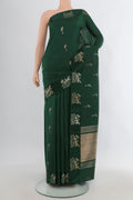 Pure Silk Bottle Green Banarasi Katan Saree with Zari Butta on the body and Plain Border.  displayed on a mannequin