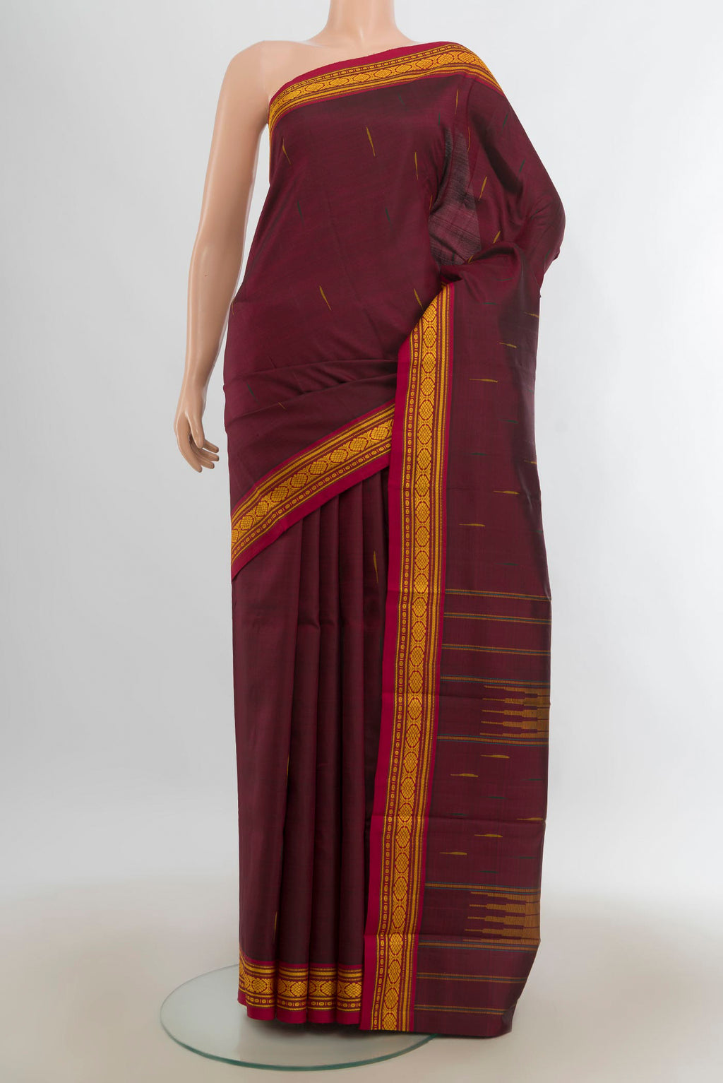 Pure Silk Coffee Brown Kanjivaram Saree with Plain Body and Silk Border.  displayed on a mannequin