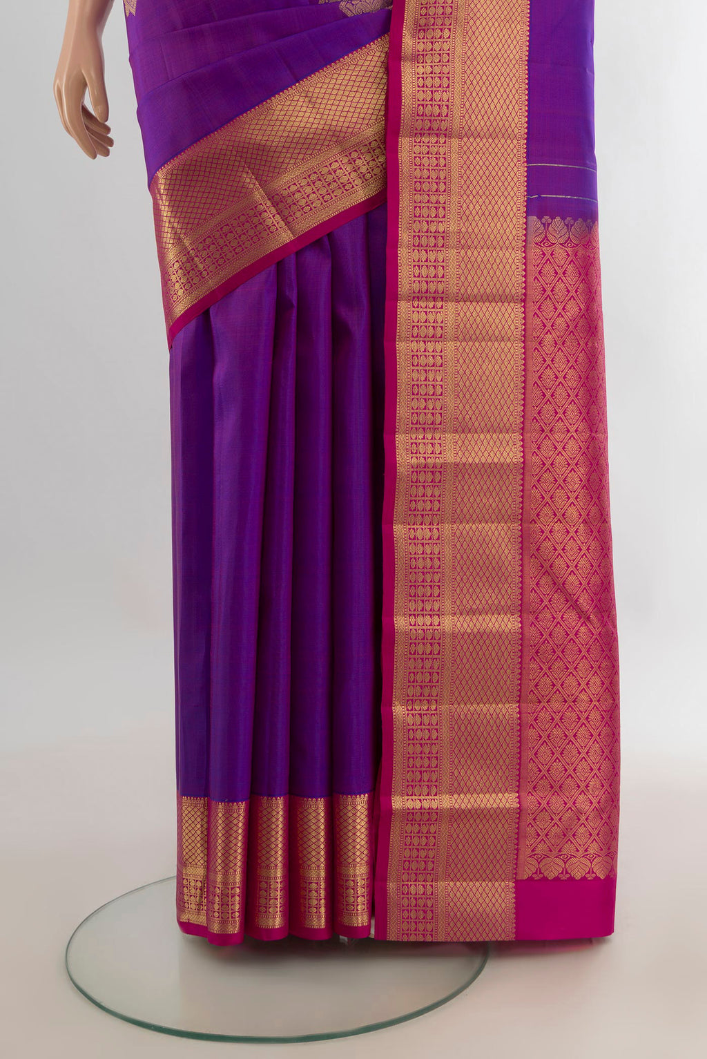 Pleats and pallu of Pure Silk Purple Kanchipuram Saree with Zari Butta on the body and Zari Border. 