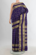 Pure Silk Navy Blue Kanjivaram Saree with Checked design on the body and Zari Border.  displayed on a mannequin