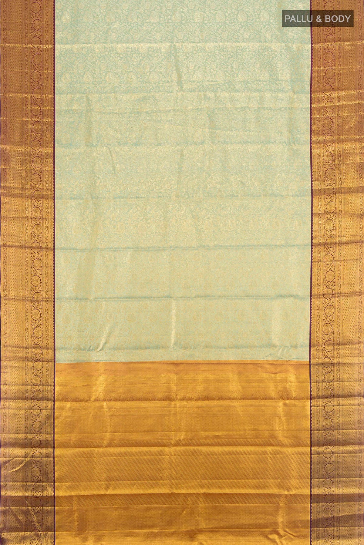 Flat view of Light Green Dual Tone Kanjivaram Tissue Saree with Zari Brocade on the body and Zari Border. 