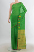 Pure Silk Green Kanchipuram Saree with Plain Body and Thread Border.  displayed on a mannequin
