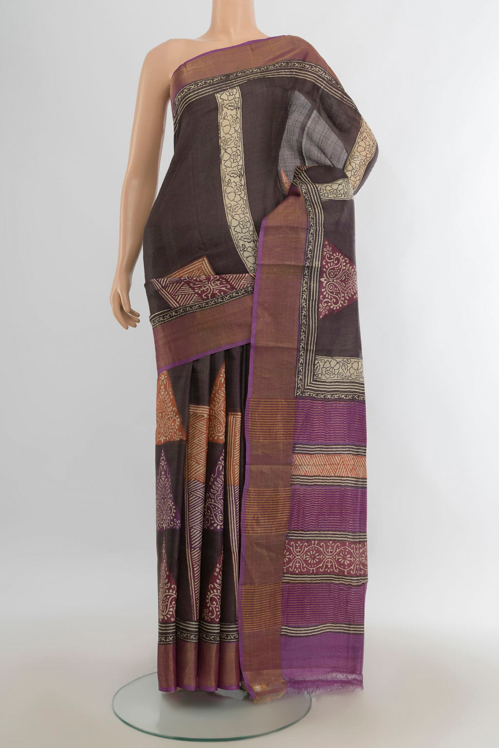 Multi Color Tussar Saree with Floral Print on the body and Silk Border.  displayed on a mannequin