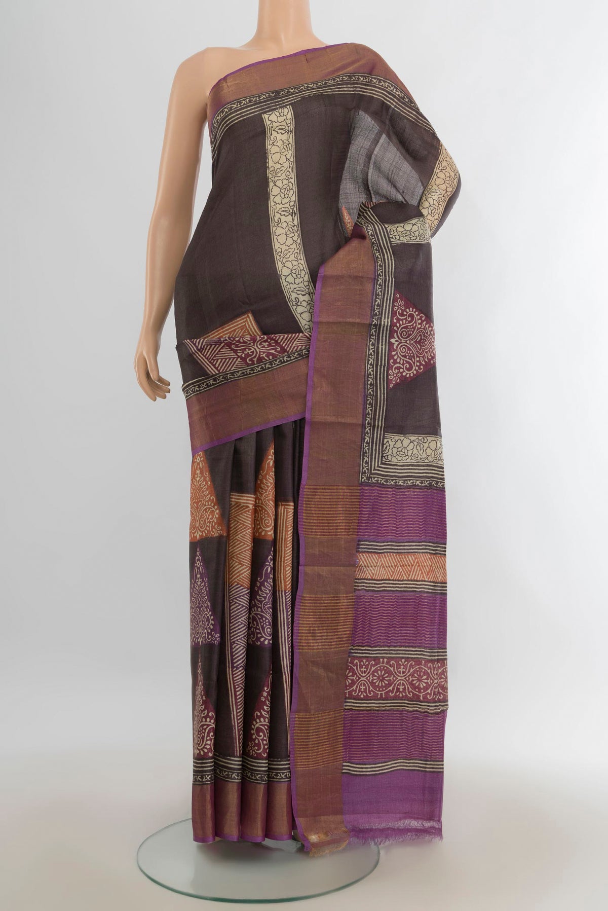 Multi Color Tussar Saree with Floral Print on the body and Silk Border.  displayed on a mannequin
