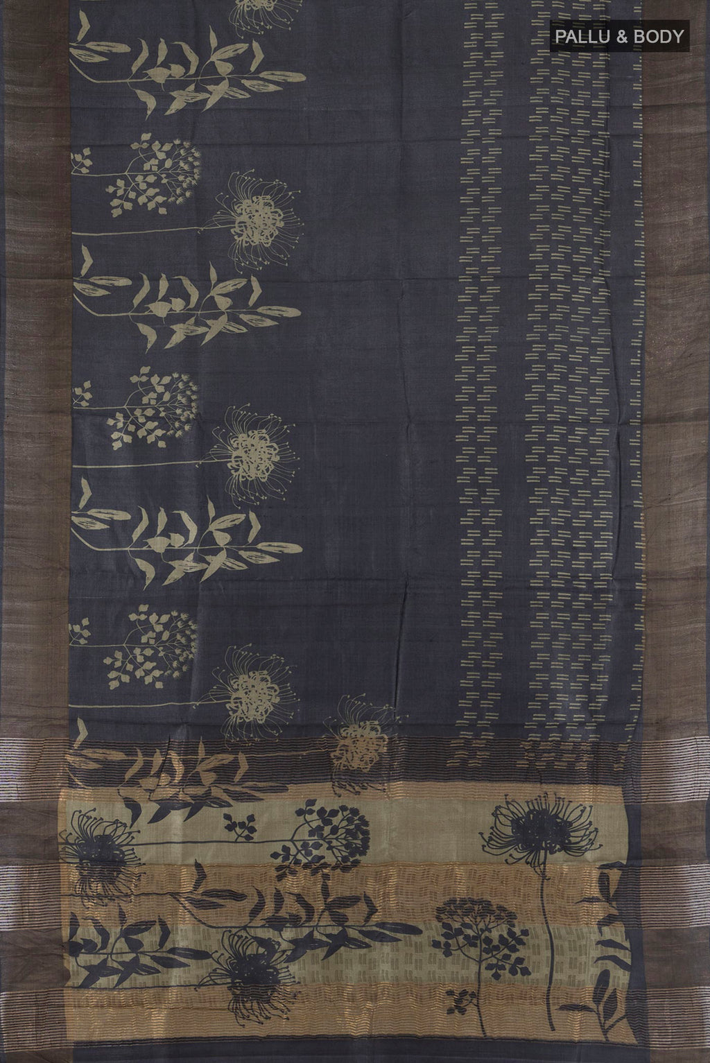 Flat view of Black Tussar Saree with Printed design on the body and Zari Border. 