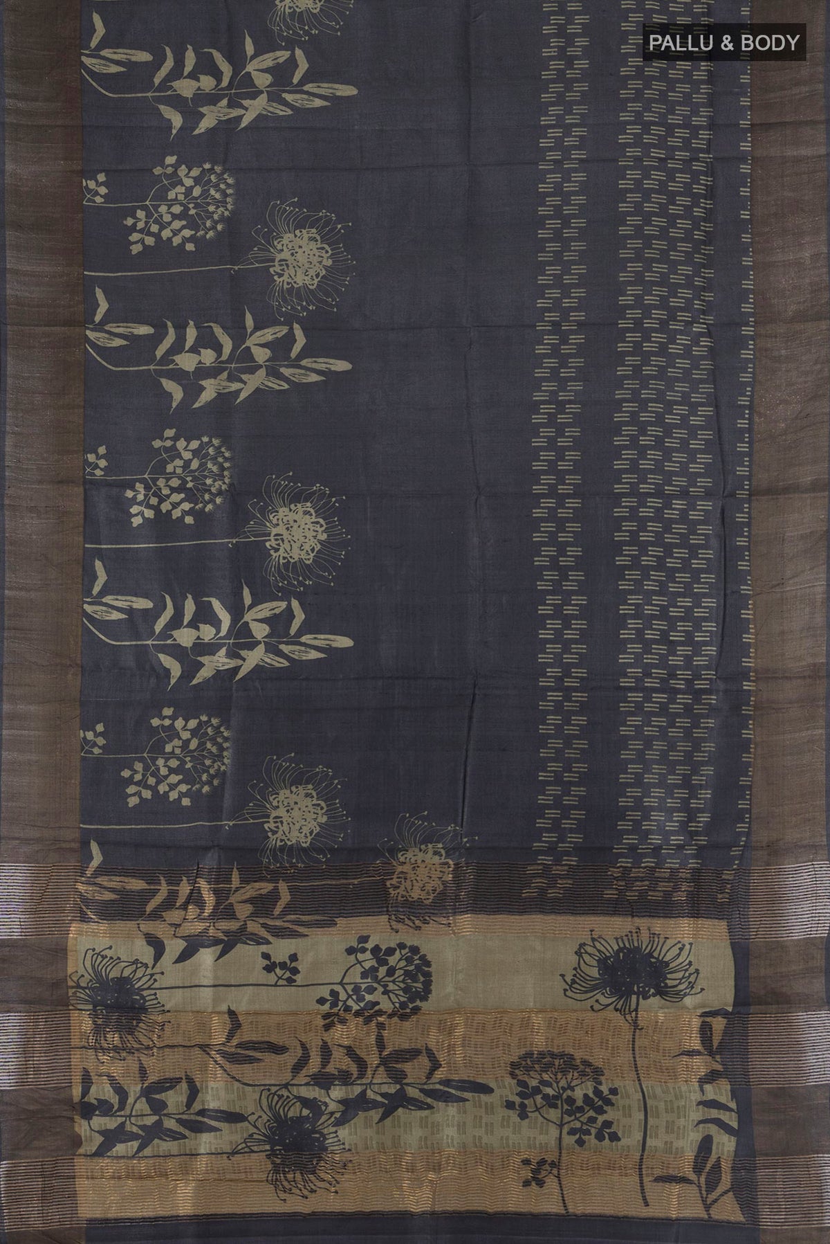 Flat view of Black Tussar Saree with Printed design on the body and Zari Border. 
