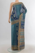 Multi Color Tussar Saree with Floral Print on the body and Silk Border.  displayed on a mannequin