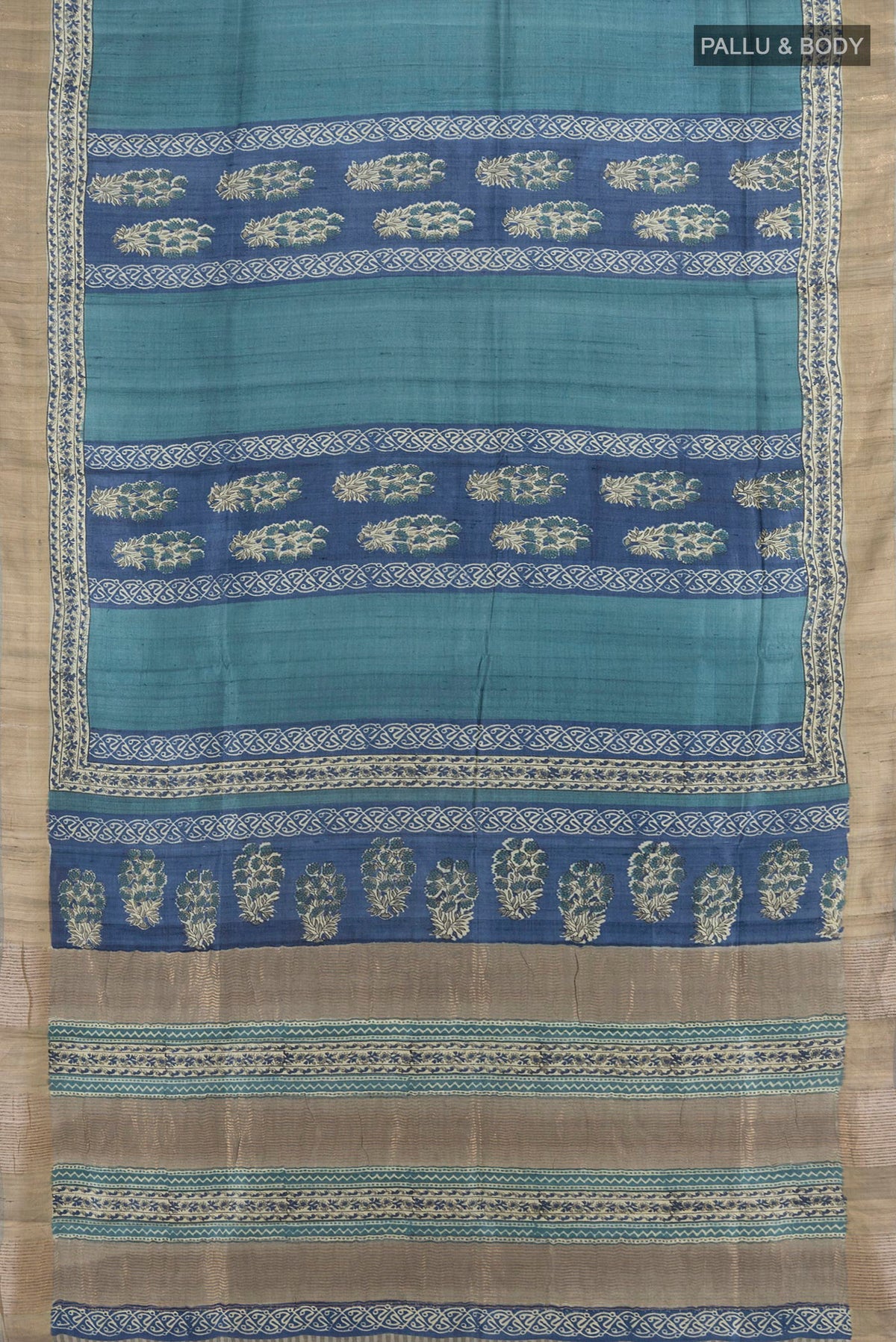 Flat view of Multi Color Tussar Saree with Floral Print on the body and Silk Border. 