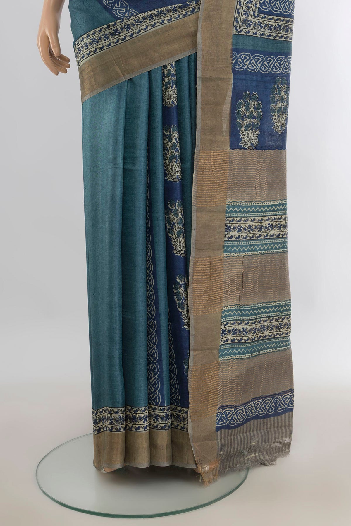 Pleats and pallu of Multi Color Tussar Saree with Floral Print on the body and Silk Border. 