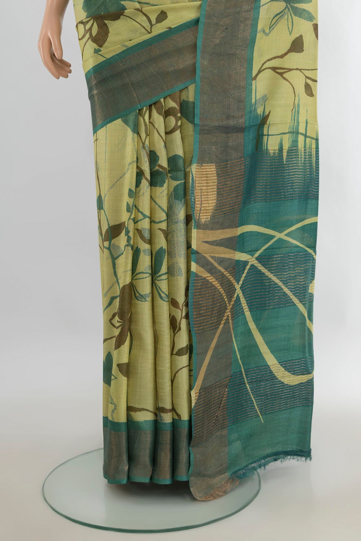 Pleats and pallu of Multi Color Tussar Saree with Floral Print on the body and Silk Border. 