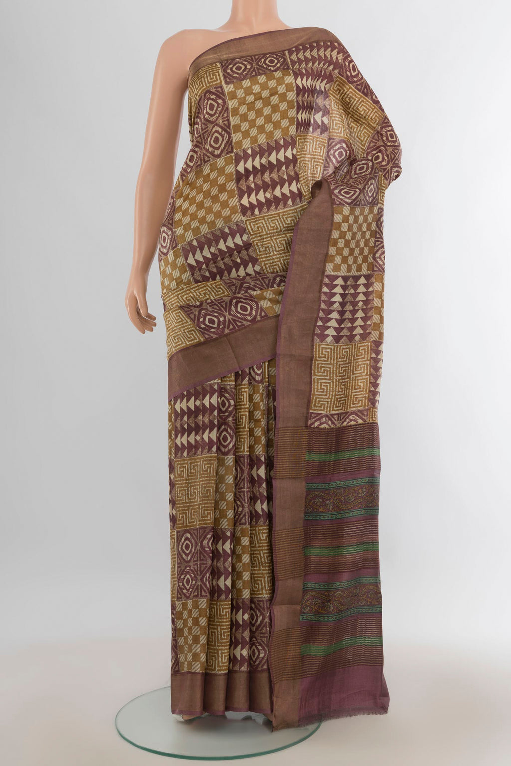 Multi Color Tussar Saree with Floral Print on the body and Silk Border.  displayed on a mannequin