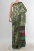 Multi Color Tussar Saree with Floral Print on the body and Silk Border.  displayed on a mannequin