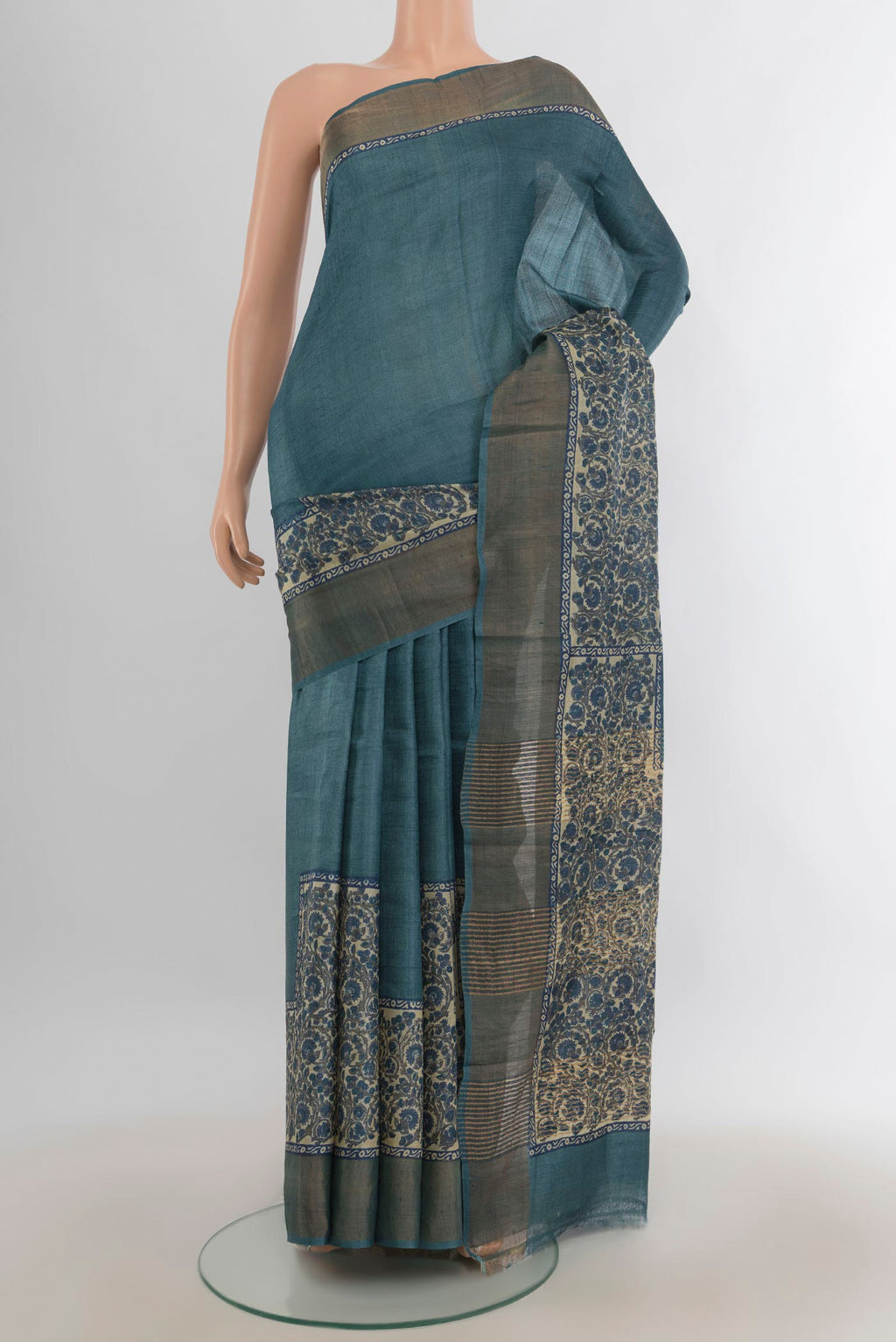 Multi Color Tussar Saree with Floral Print on the body and Silk Border.  displayed on a mannequin