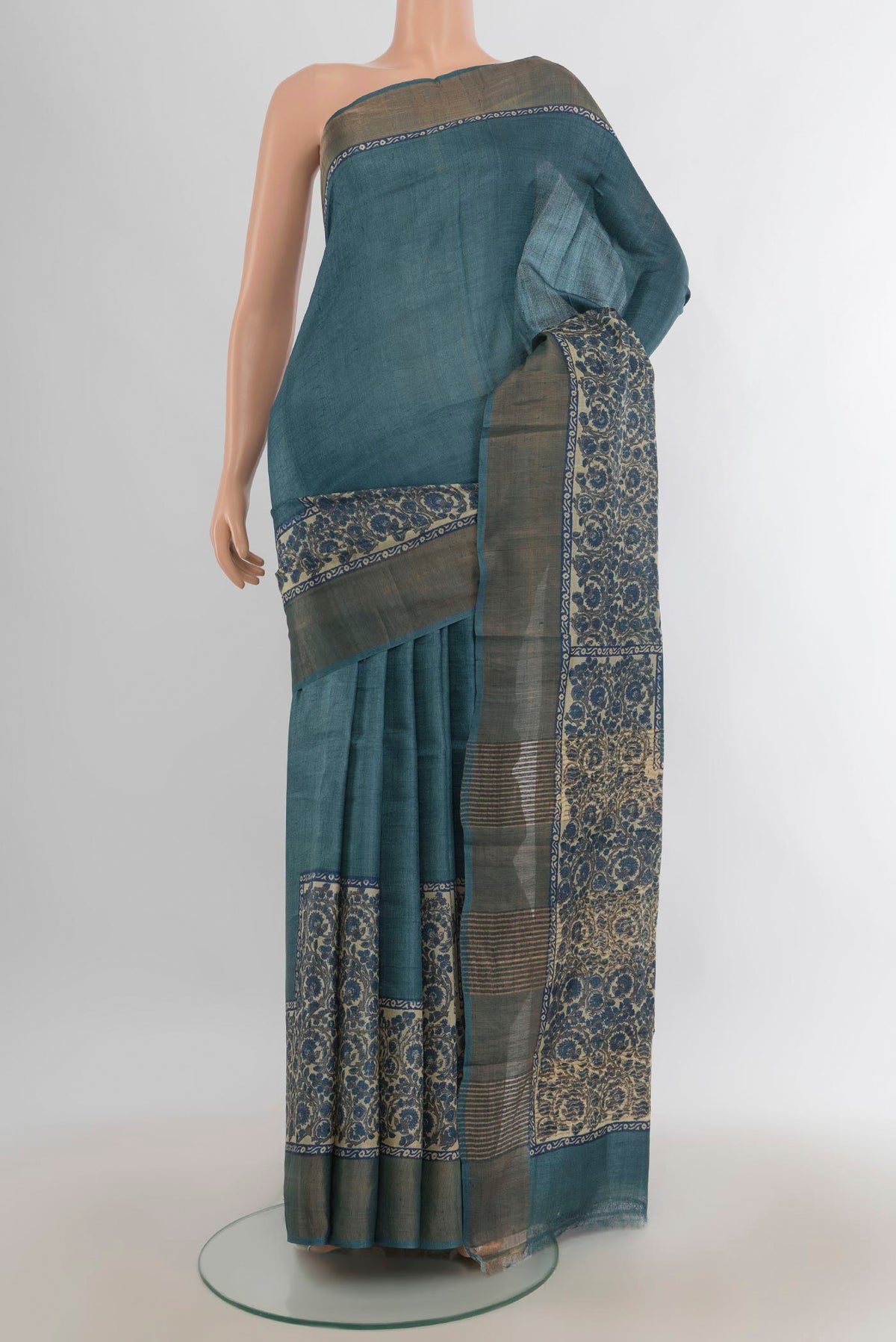 Multi Color Tussar Saree with Floral Print on the body and Silk Border.  displayed on a mannequin