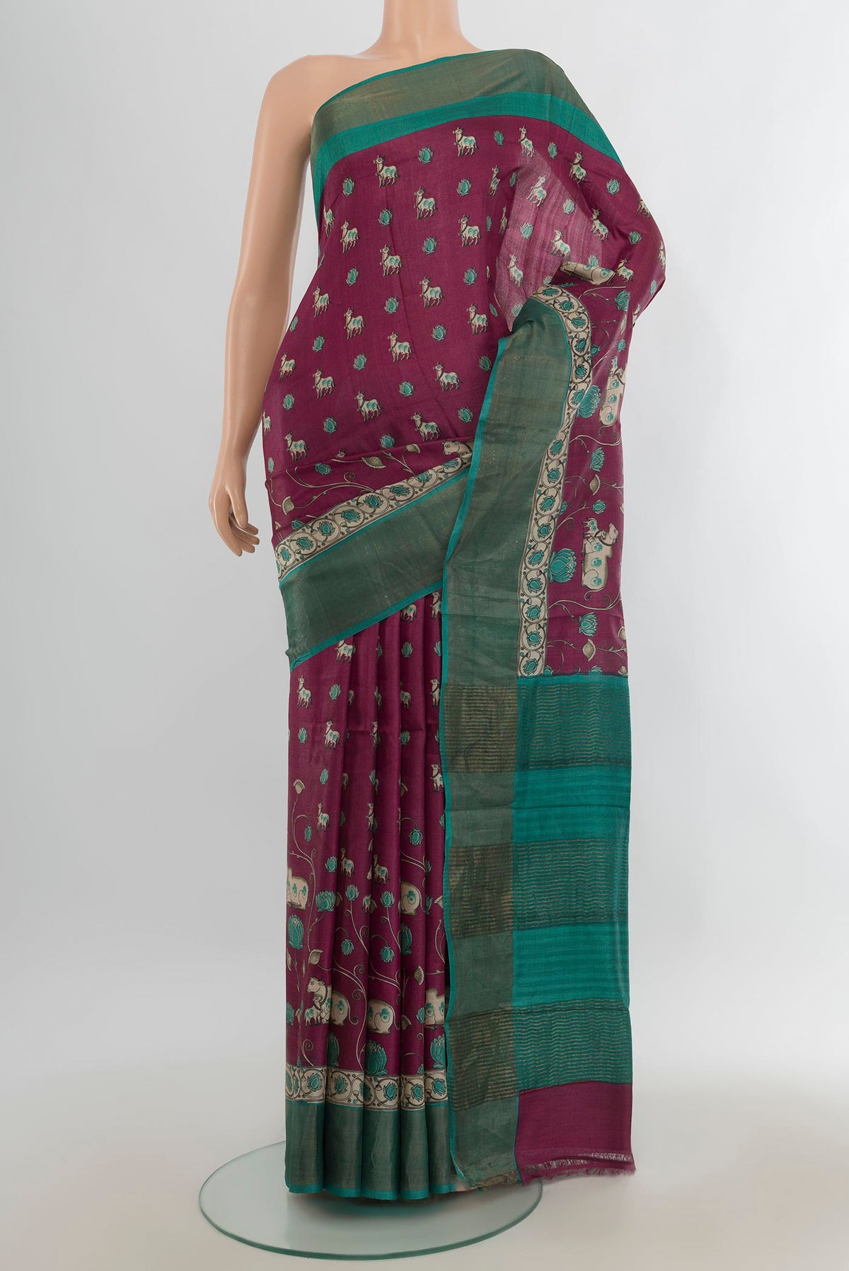 Multi Color Tussar Saree with Floral Print on the body and Silk Border.  displayed on a mannequin