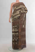 Multi Color Tussar Saree with Floral Print on the body and Silk Border.  displayed on a mannequin