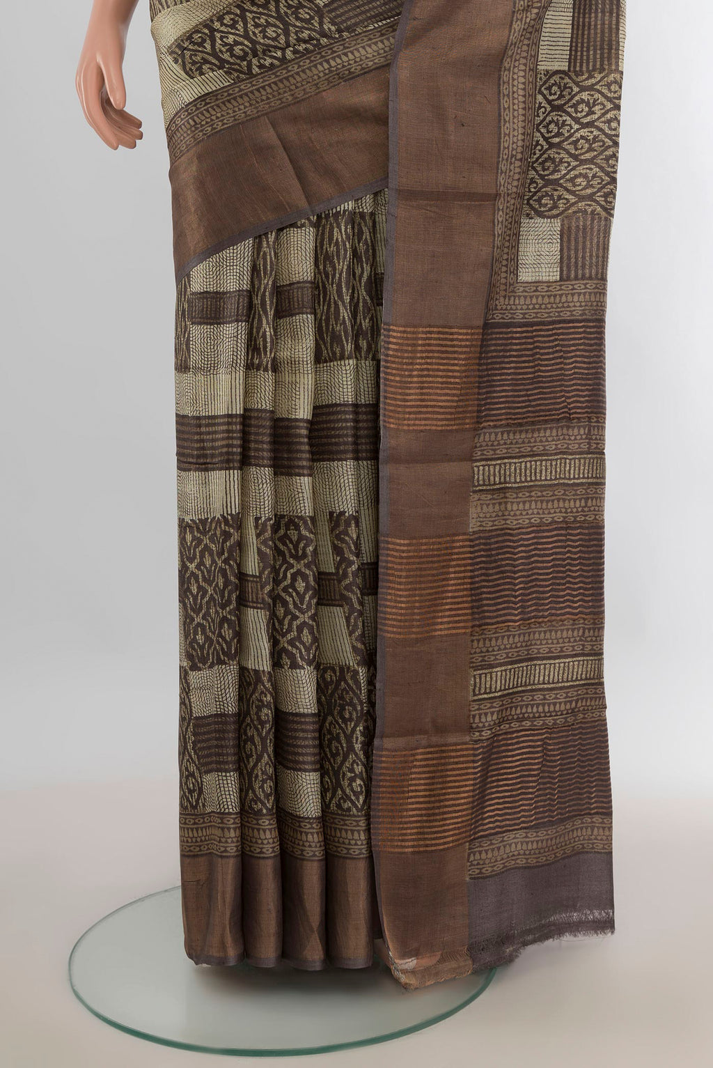 Pleats and pallu of Multi Color Tussar Saree with Floral Print on the body and Silk Border. 
