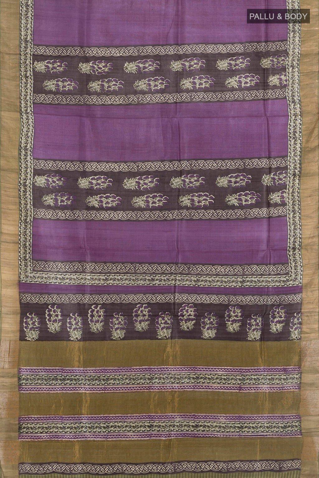 Flat view of Purple Tussar Saree with Printed design on the body and Zari Border. 