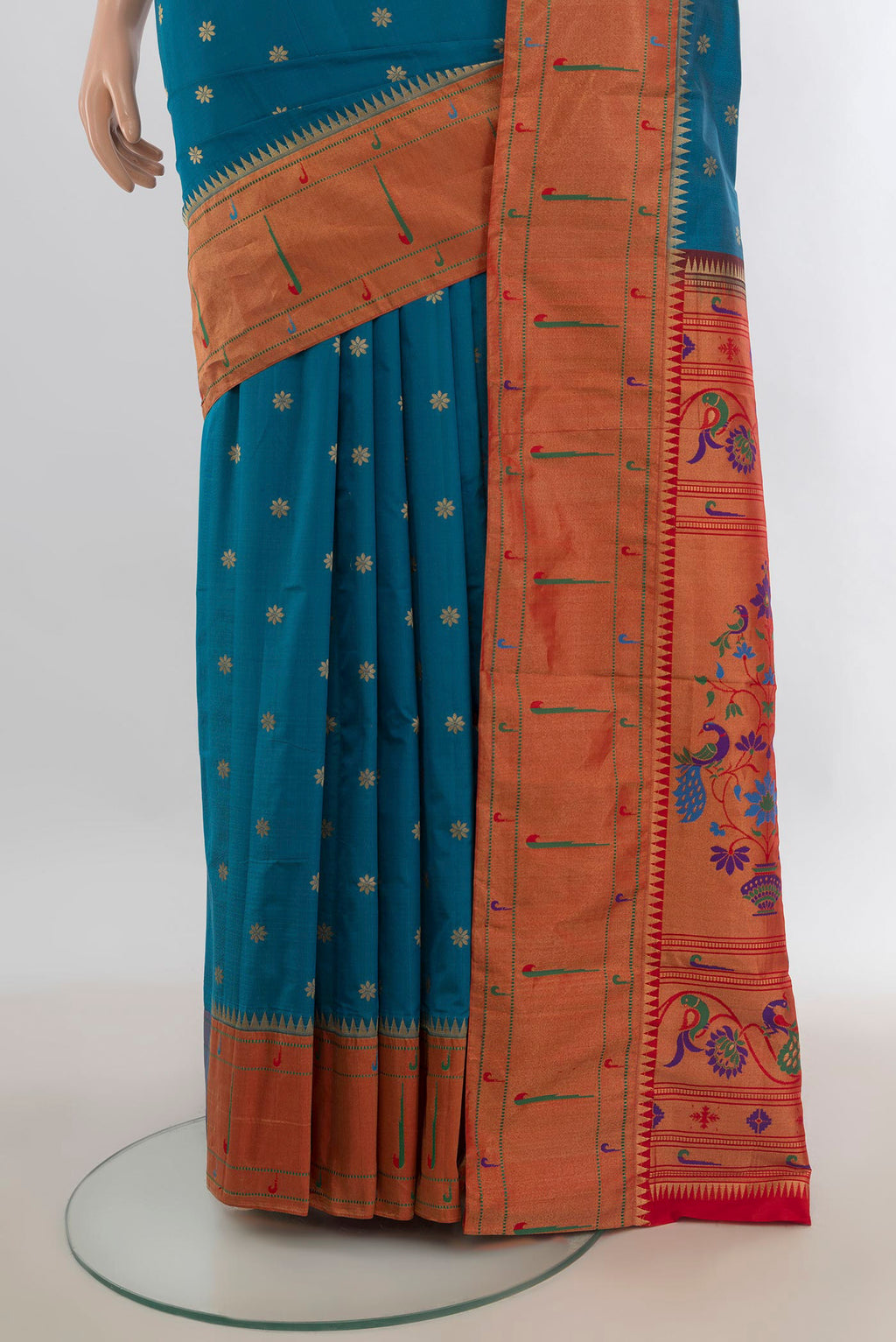 Pleats and pallu of Peacock Blue Blended Paithani Silk Saree with Zari Butta on the body and Paithani Border. 