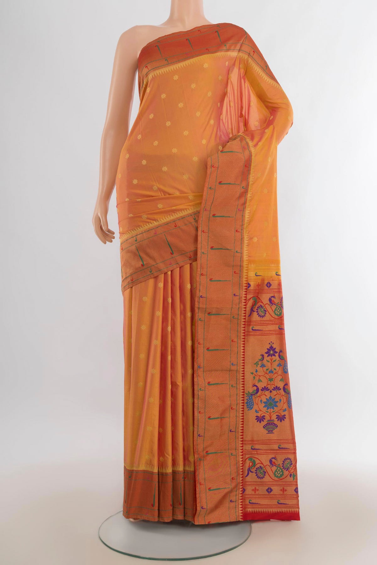 Multi Color Blended Paithani Silk Saree with Zari Butta on the body and Paithani Border.  displayed on a mannequin