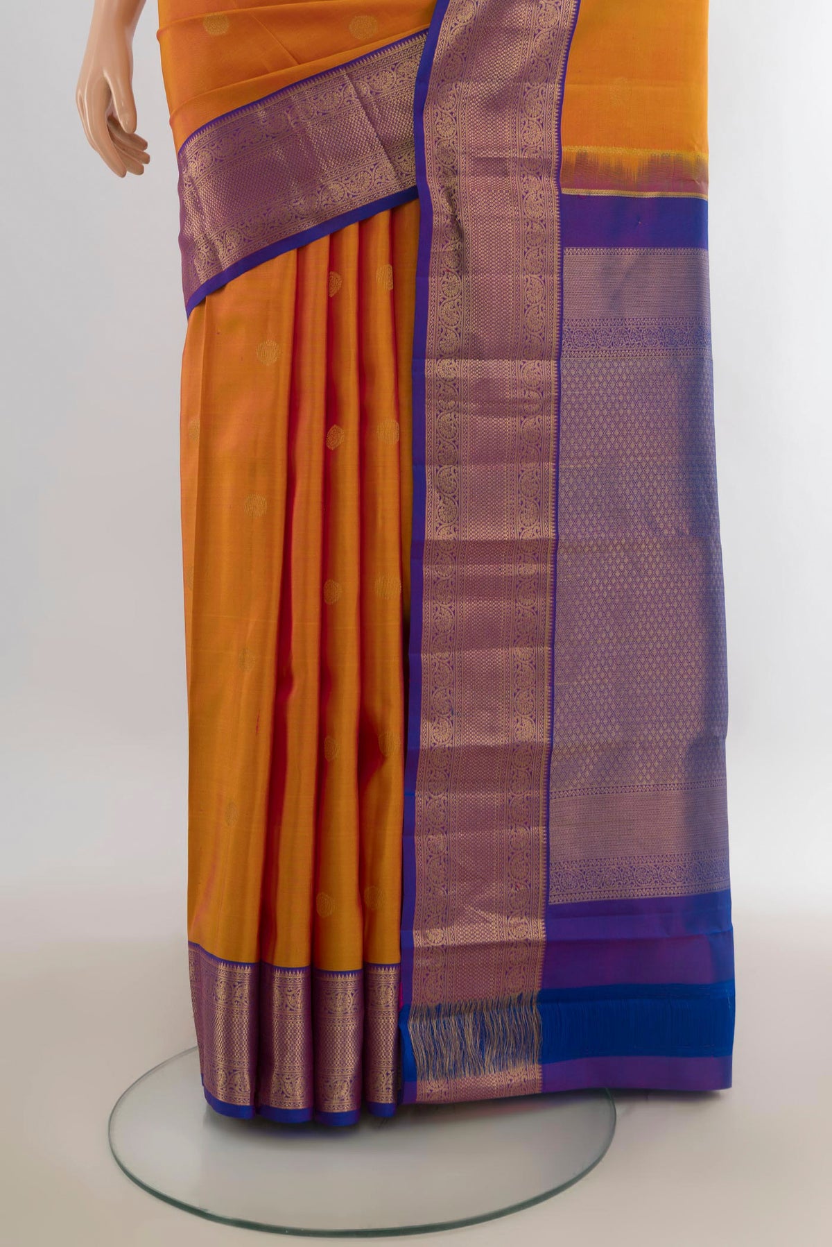 Pleats and pallu of Pure Silk Yellow Kanjivaram Saree with Zari Butta on the body and Zari Border. 