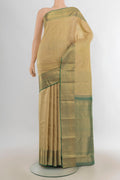 Pure Silk Beige Kanjivaram Saree with Zari Butta on the body and Zari Border.  displayed on a mannequin