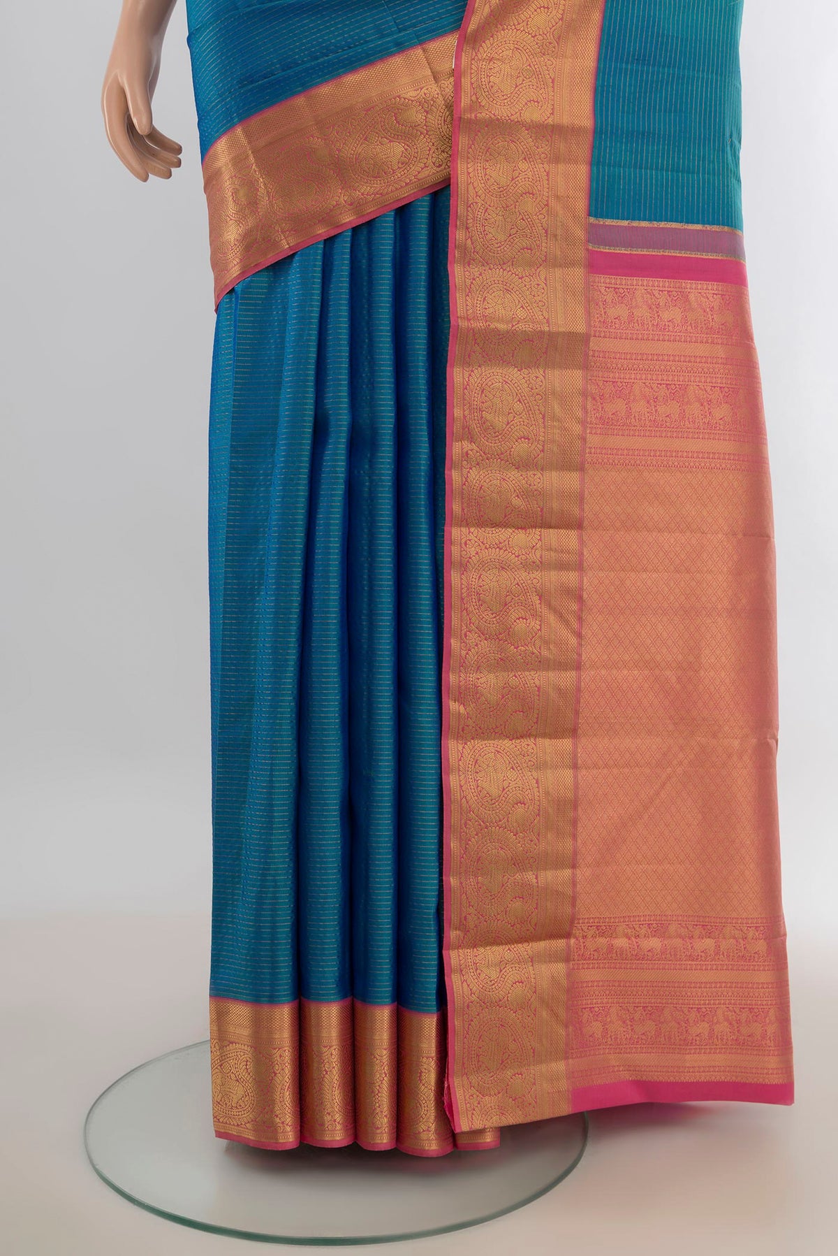 Pleats and pallu of Pure Silk Light Blue Kanjivaram Saree with Zari Butta on the body and Silk Border. 
