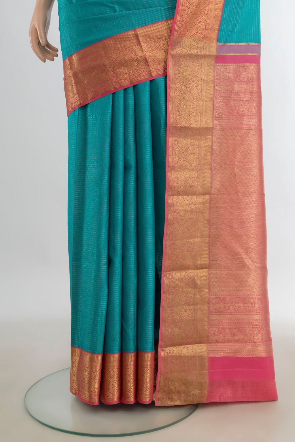 Pleats and pallu of Pure Silk Light Blue Kanjivaram Saree with Zari Butta on the body and Silk Border. 